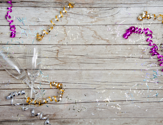 Champagne flutes and festive ribbons