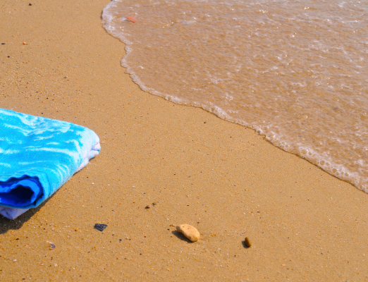 Beach towel on sand